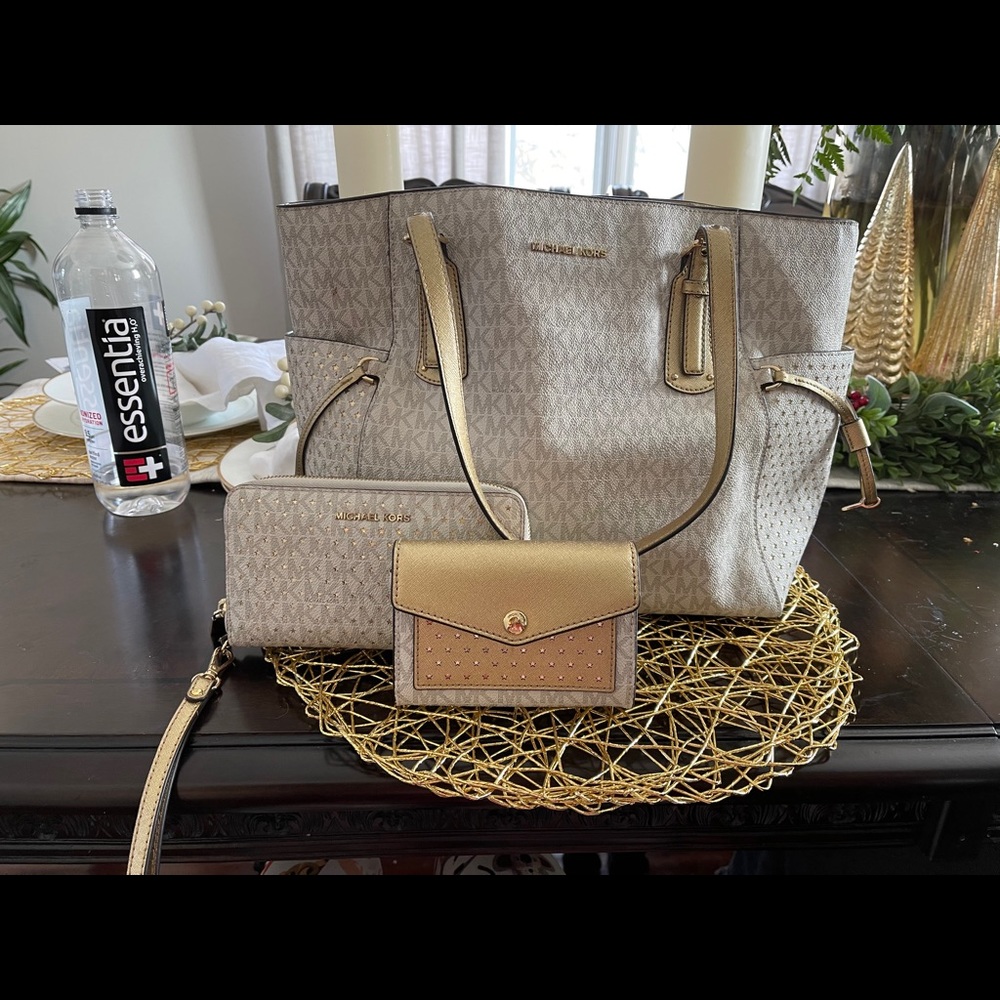 Michael Kors purse and 2 matching wallets
